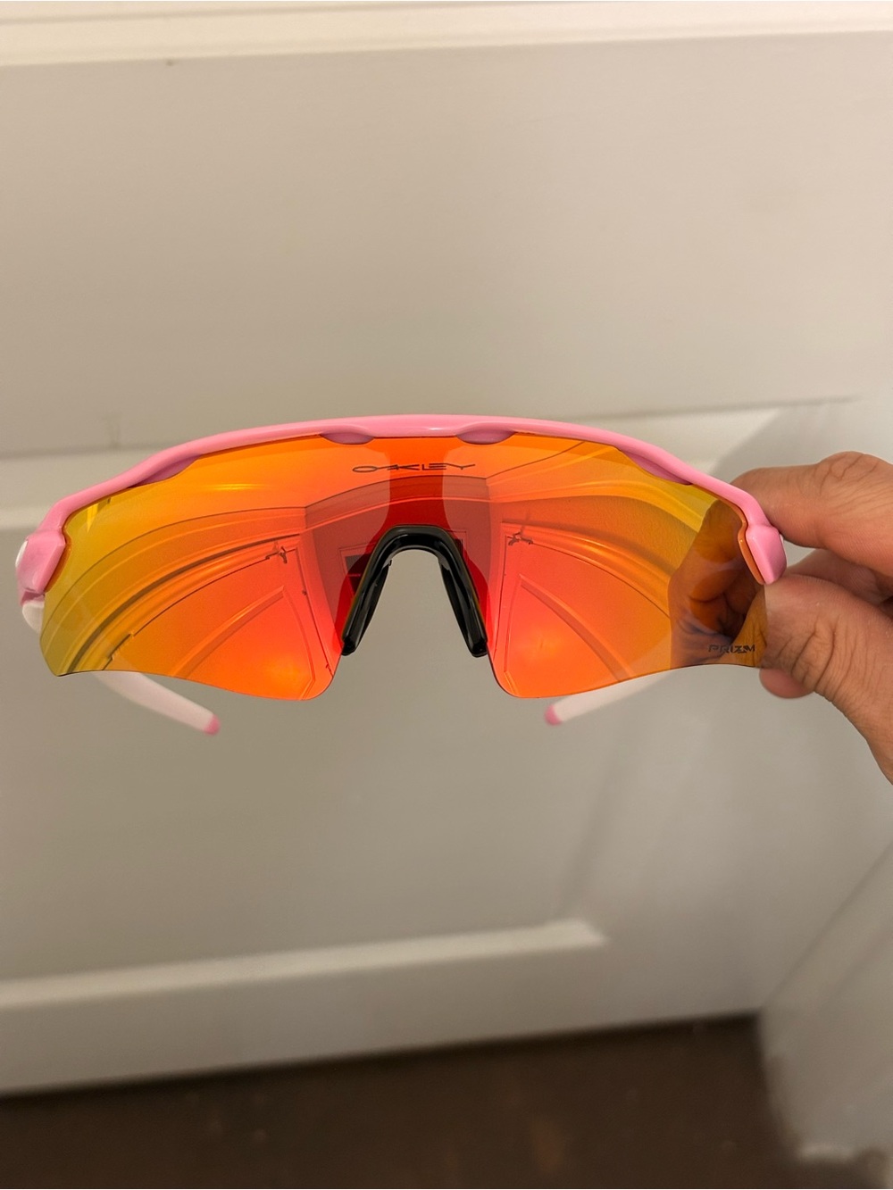 Oakley Pink Frame Sunglasses with Red-Orange Mirrored Lens